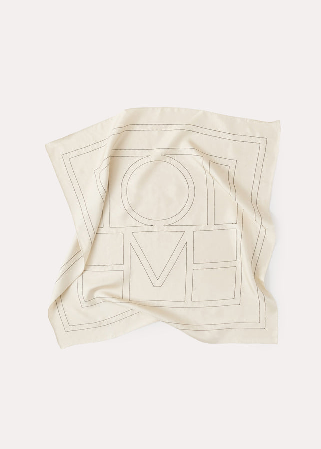 Embroidered monogram silk scarf creme